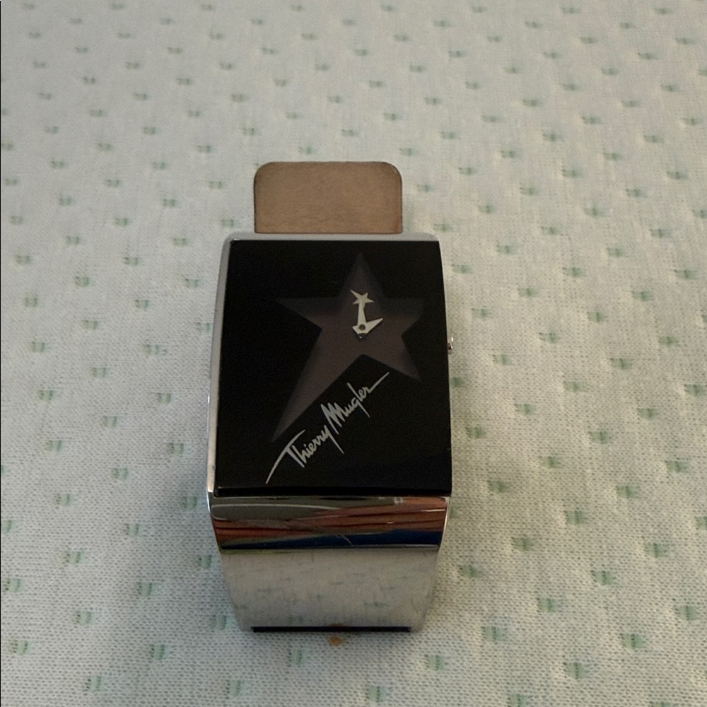 Thierry Mugler Silver Cuff Watch with Black Star Dial